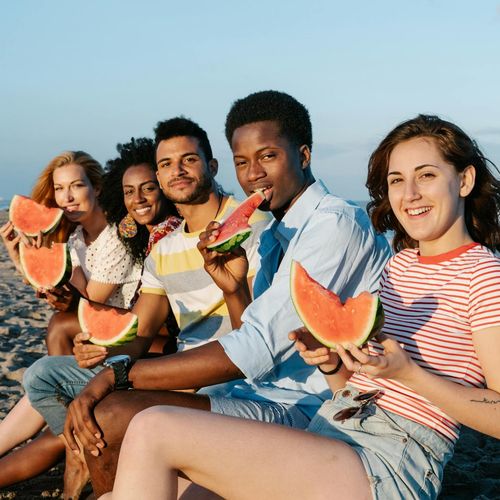 A diverse group of people feeling content and relaxed.